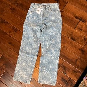 Adika light blue jeans with white floral pattern